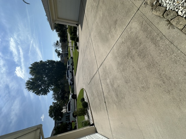 Before exterior cleaning: Driveway Pressure Washing @ Lynn's in River Hills Reserve in Fleming Island